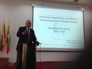 Brig Gen Vincent briefs senior Burmese military and civilian officials at the Myanmar Peace Center